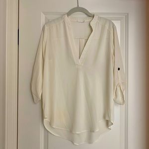 Lush cream roll-tab sleeve hi-low tunic blouse